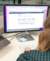 Click Rain Associate Director of Marketing, Bailey Wood, using Google Gemini at her desk.