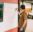 over the shoulder picture of Joseph at the white board writing code