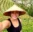 photo of lemonly intern in rice field with hat on