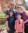 Family photo of male employee, his wife, and three children on a hike in the mountains