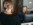 Female employee looking up from her computer with a smile on her face to have a conversation with another employee