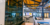 A wide-angle photo taken of the Click Rain Inc office with large LED signs of the Click Rain and Lemonly logos in the background.