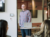 James in a plaid shirt standing in the workshop at Click Rain in headquarters